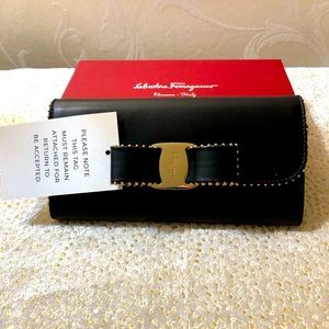 SALVATORE FERRAGAMO BLACK LEATHER BOW WALLET WITH GOLD HARDWARE. NEW W TAGS/BOX